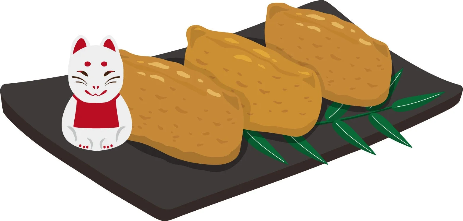 いなり寿司と狐の置物