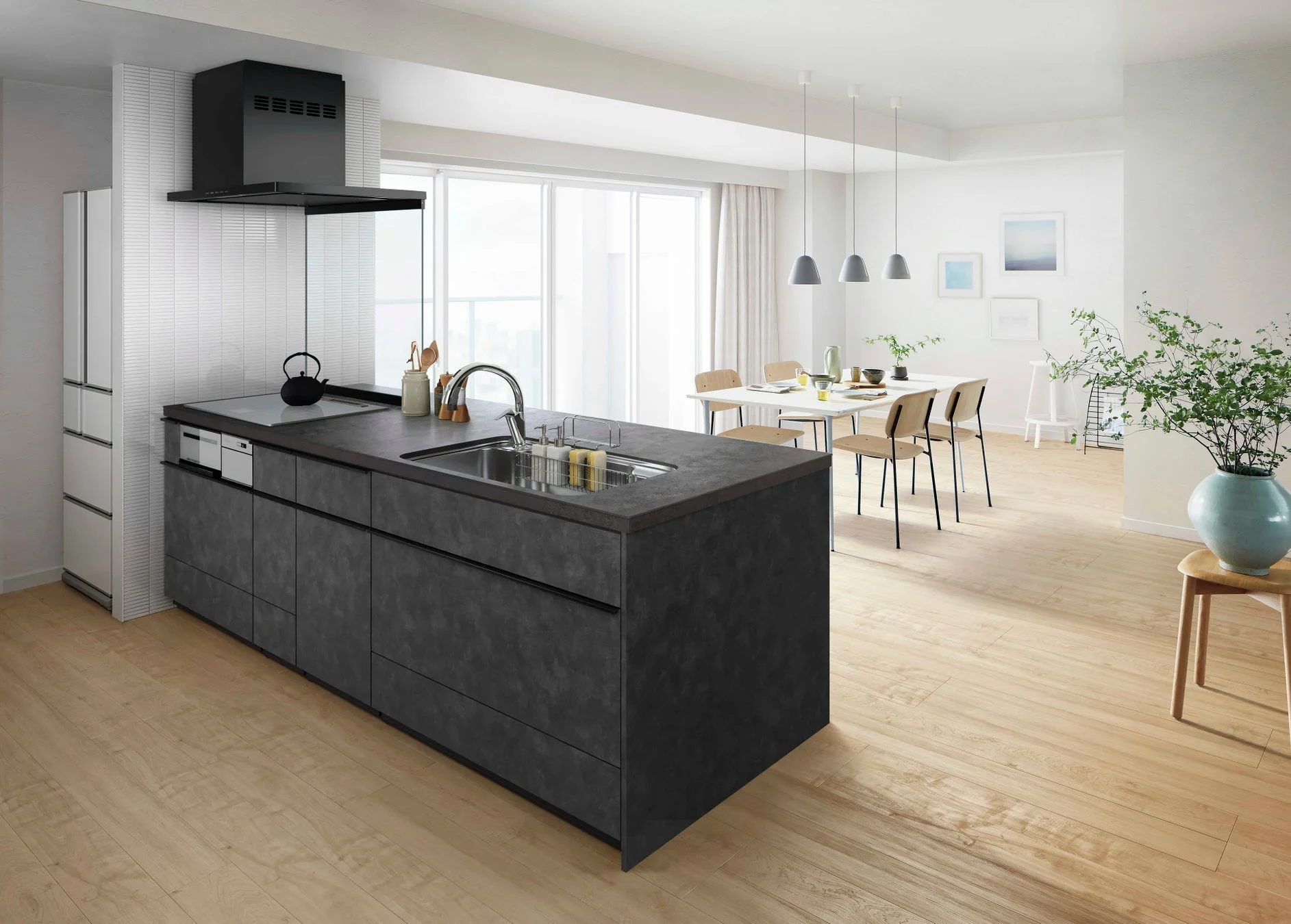 モダンなアイランドキッチンとダイニングエリアが一体となったリビング空間