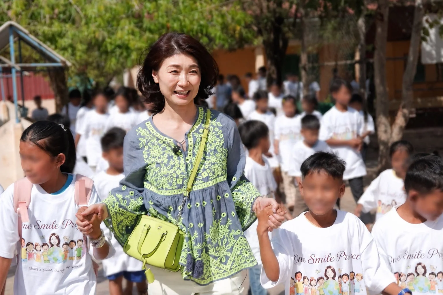 One Smile Projectのロゴと子供たち